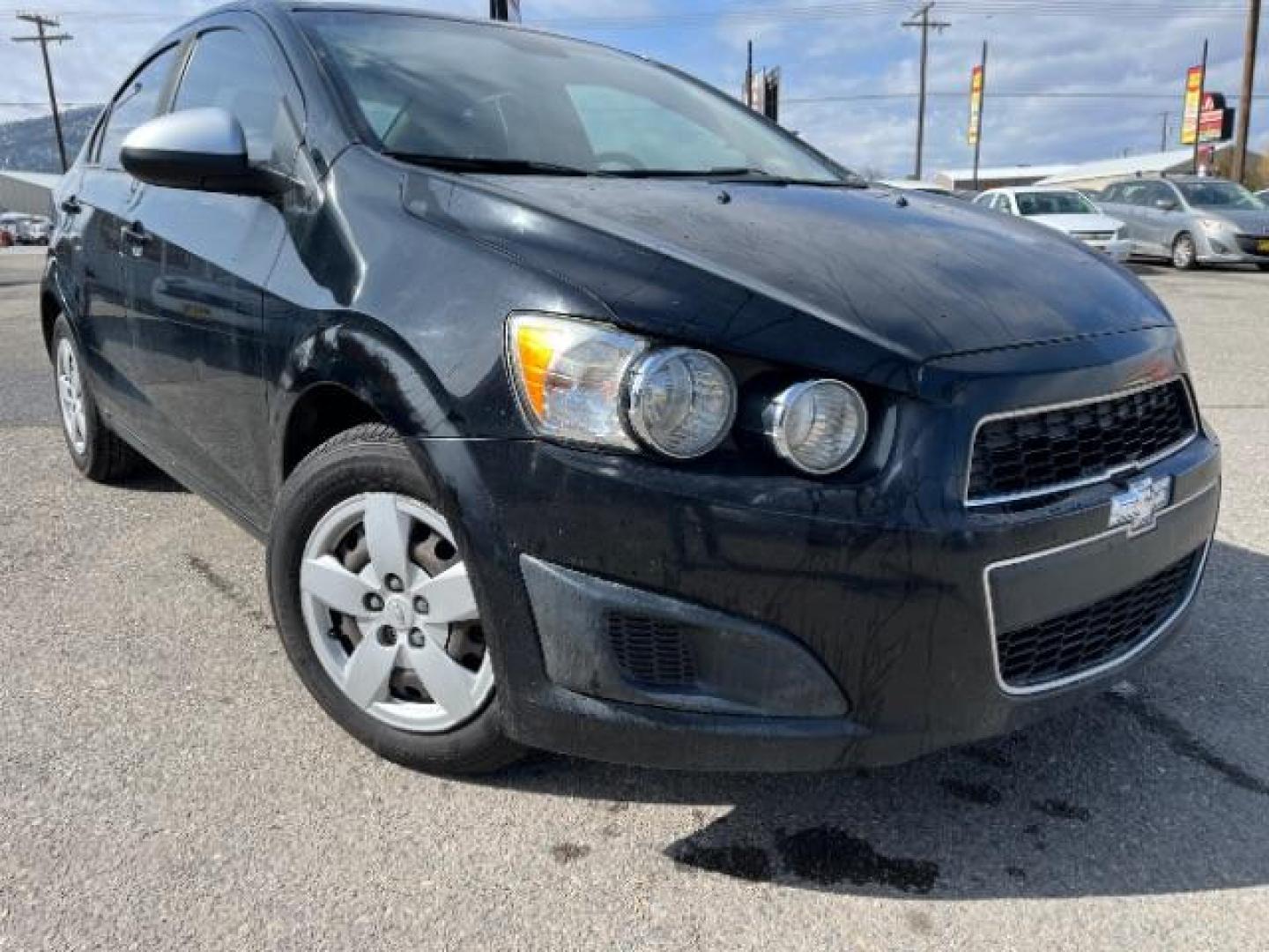 2016 Chevrolet Sonic LS Auto Sedan (1G1JA5SH2G4) with an 1.8L L4 DOHC 24V engine, 6-Speed Automatic transmission, located at 1821 N Montana Ave., Helena, MT, 59601, 46.603447, -112.022781 - Photo#1