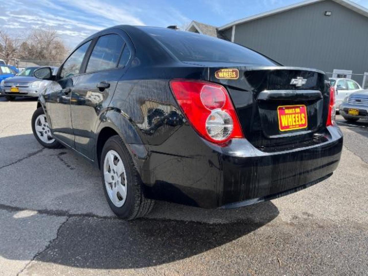 2016 Chevrolet Sonic LS Auto Sedan (1G1JA5SH2G4) with an 1.8L L4 DOHC 24V engine, 6-Speed Automatic transmission, located at 1821 N Montana Ave., Helena, MT, 59601, 46.603447, -112.022781 - Photo#3