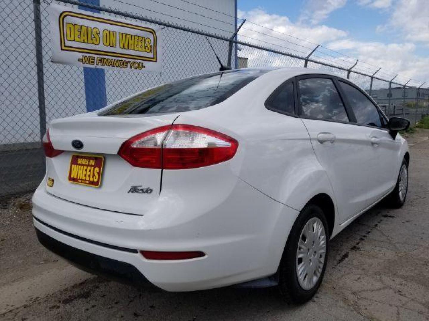 2017 Ford Fiesta S Sedan (3FADP4AJ0HM) with an 1.6L L4 DOHC 16V engine, located at 601 E. Idaho St., Kalispell, MT, 59901, 48.203983, -114.308662 - Photo#4