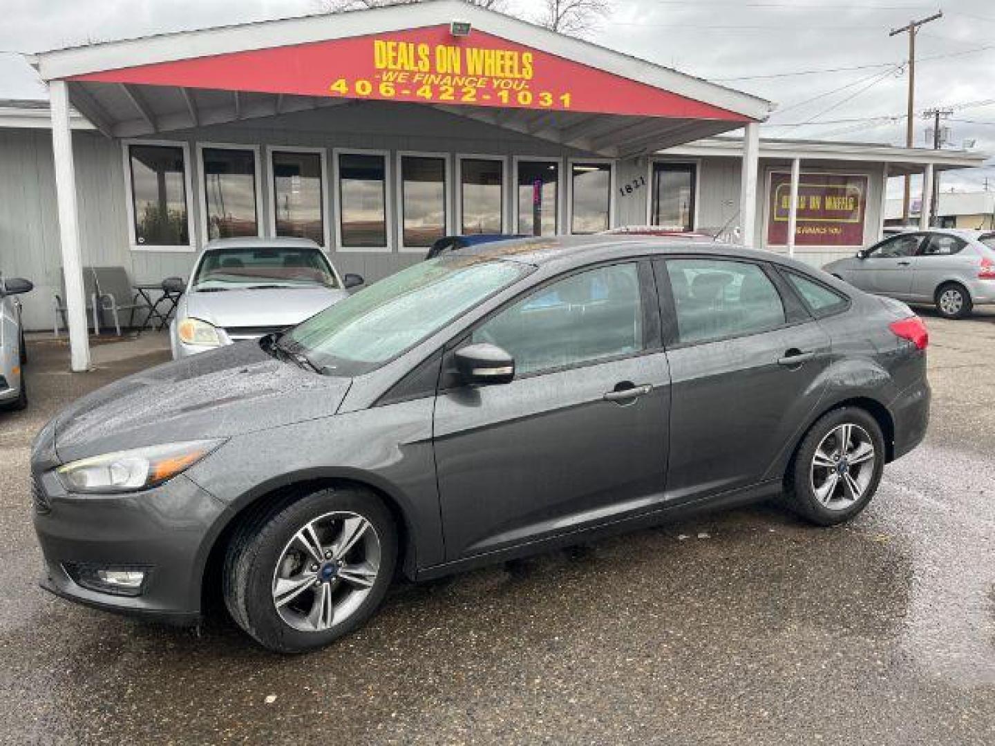 2017 Ford Focus SE Sedan (1FADP3FEXHL) with an 1.0L L3 engine, located at 1821 N Montana Ave., Helena, MT, 59601, 46.603447, -112.022781 - Photo#0