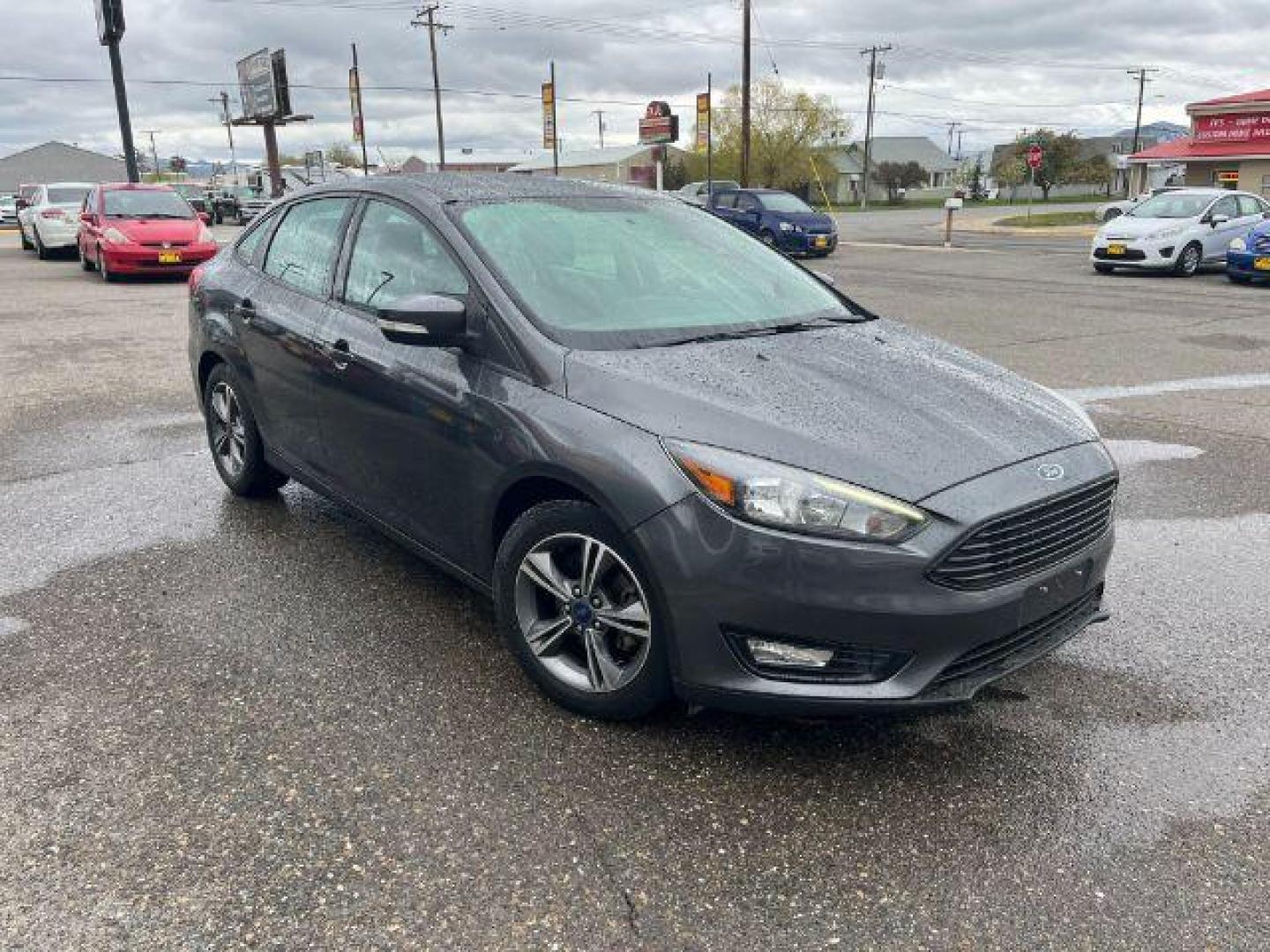 2017 Ford Focus SE Sedan (1FADP3FEXHL) with an 1.0L L3 engine, located at 1821 N Montana Ave., Helena, MT, 59601, 46.603447, -112.022781 - Photo#2