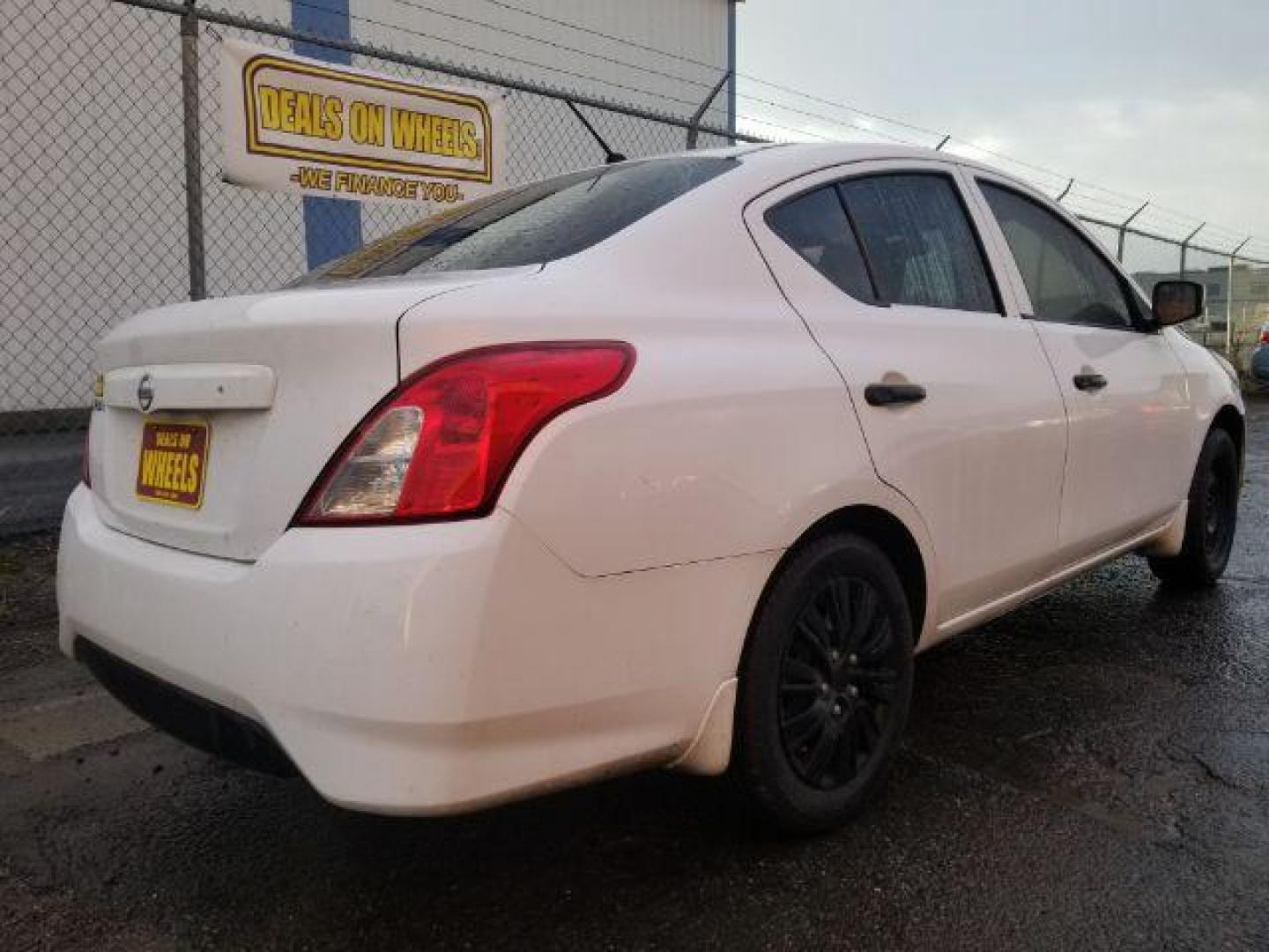 2018 Nissan Versa 1.6 S 5M (3N1CN7AP4JL) with an 1.6L L4 DOHC 16V engine, 5-Speed Manual transmission, located at 601 E. Idaho St., Kalispell, MT, 59901, 48.203983, -114.308662 - Photo#4